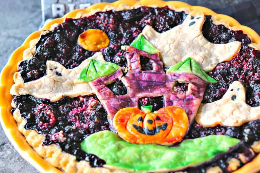 Closeup photo of a colorful boo berry pie for Halloween.