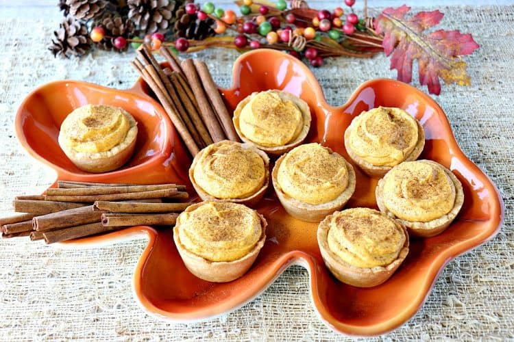 pumpkin cheesecake tartlets with a cookie crust