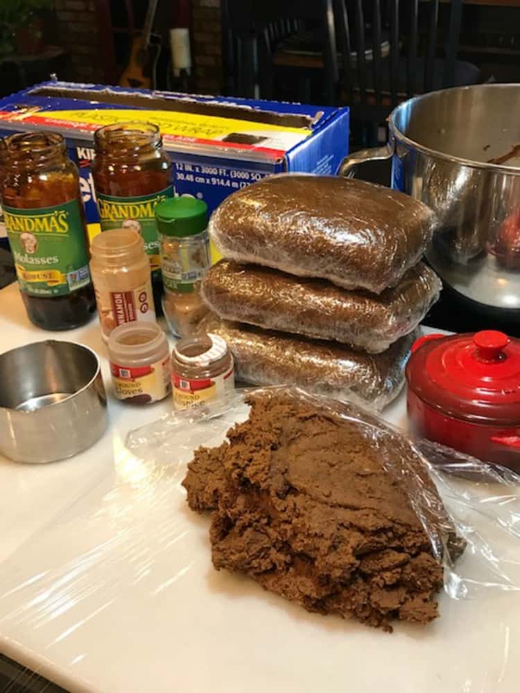 A photo of gingerbread dough and the ingredients for making Gingerbread House Recipe and Tutorial