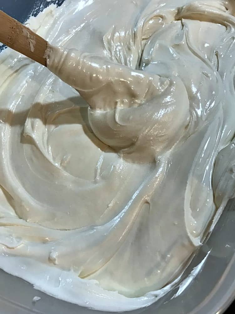 Big bowl of royal icing for decorating gingerbread house. - kudoskitchenbyrenee.com