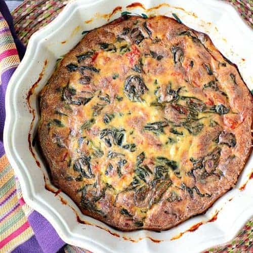 Overhead picture of spinach casserole in a round dish