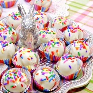 A cute bunny tray filled with No-Bake Shortbread Cookie Truffles with sprinkles.