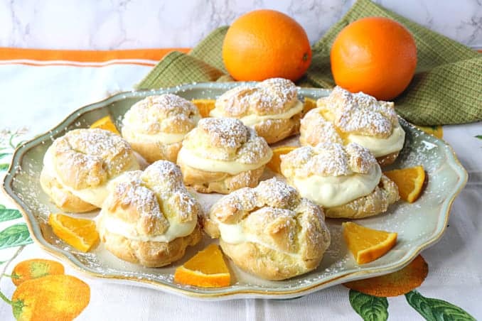 perfect profiteroles with orange curd whipped cream filling