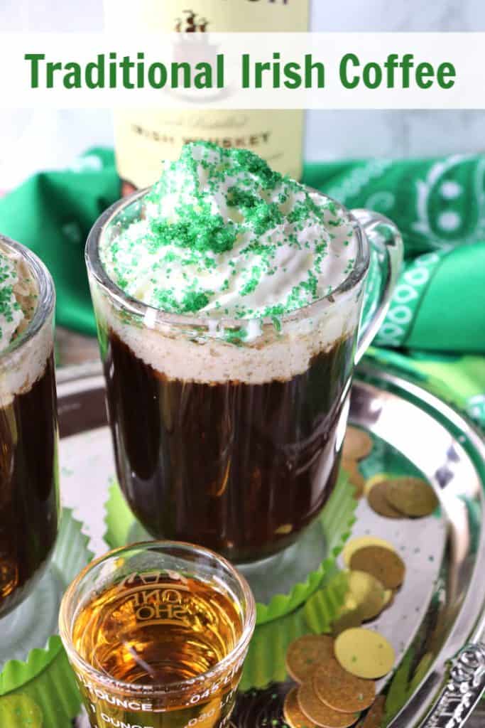 Closeup photo of Irish coffee with a shot of whiskey, whipped cream, and green sugar