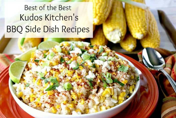 A bowl of Mexican Street Corn with green onions, and limes in a white bowl. Best BBQ side dishes