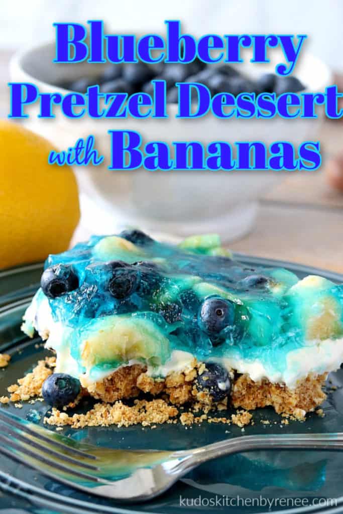 A closeup vertical picture of a slice of blueberry pretzel dessert on a blue plate with a fork and title text overlay graphic