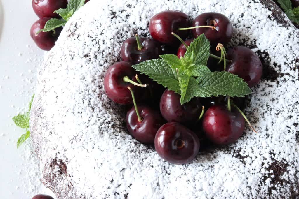 Overhead photo of a chocolate cherry bundt cake for chocolate dessert recipes roundup