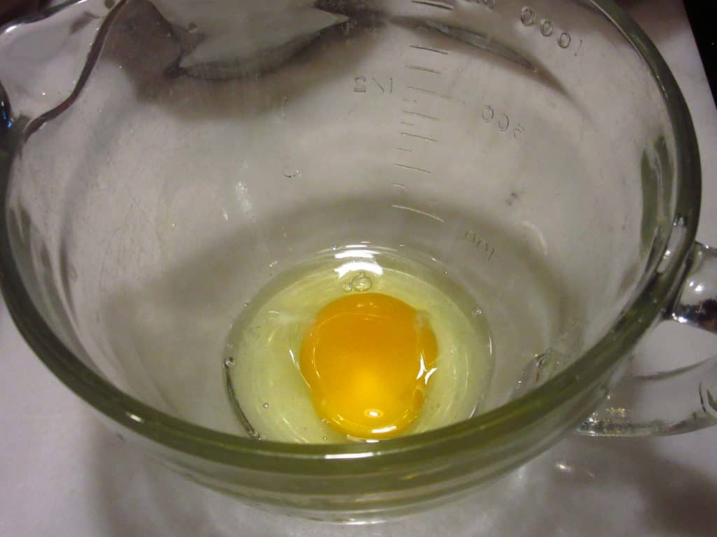 One egg in a glass bowl.
