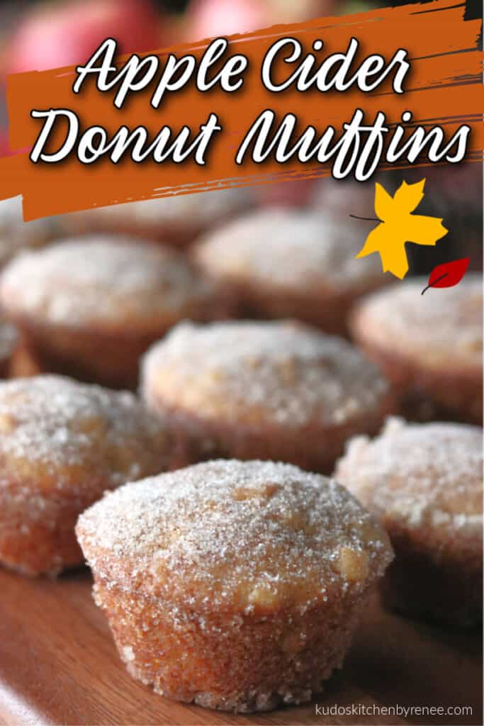 A vertical close up photo of an Apple Cider Donut Muffin with cinnamon sugar and a title text overlay graphic