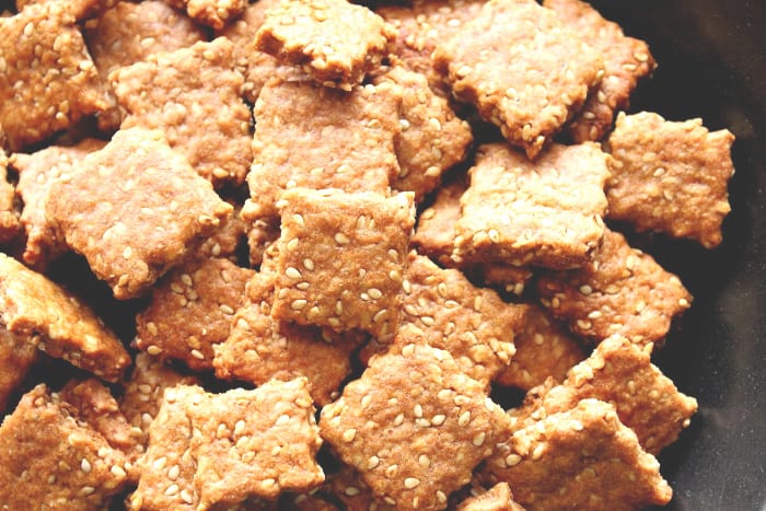 Closeup photo of homemade honey sesame seed crackers.