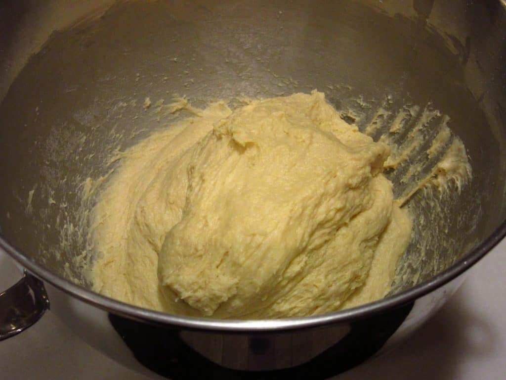 Batter bread dough in a mixing bowl.