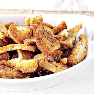 A bunch of homemade Everything Bagel Chips in a white bowl.