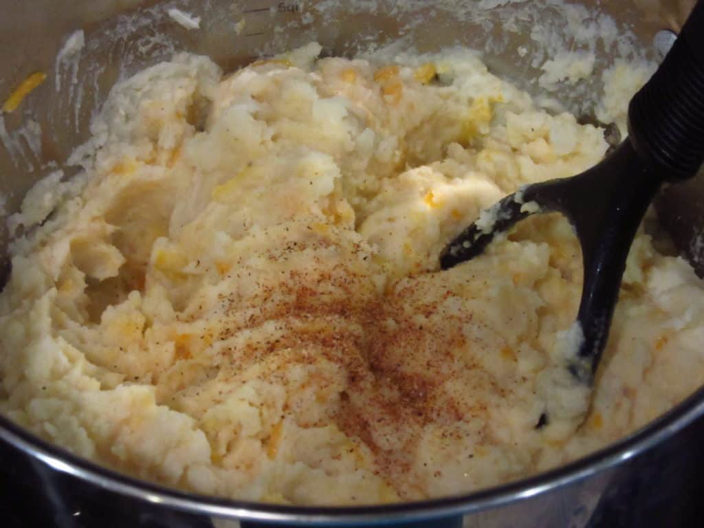 Mashed potatoes with grated nutmeg.