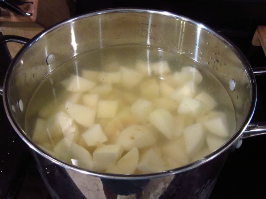 Potatoes in a pot of boiling water.