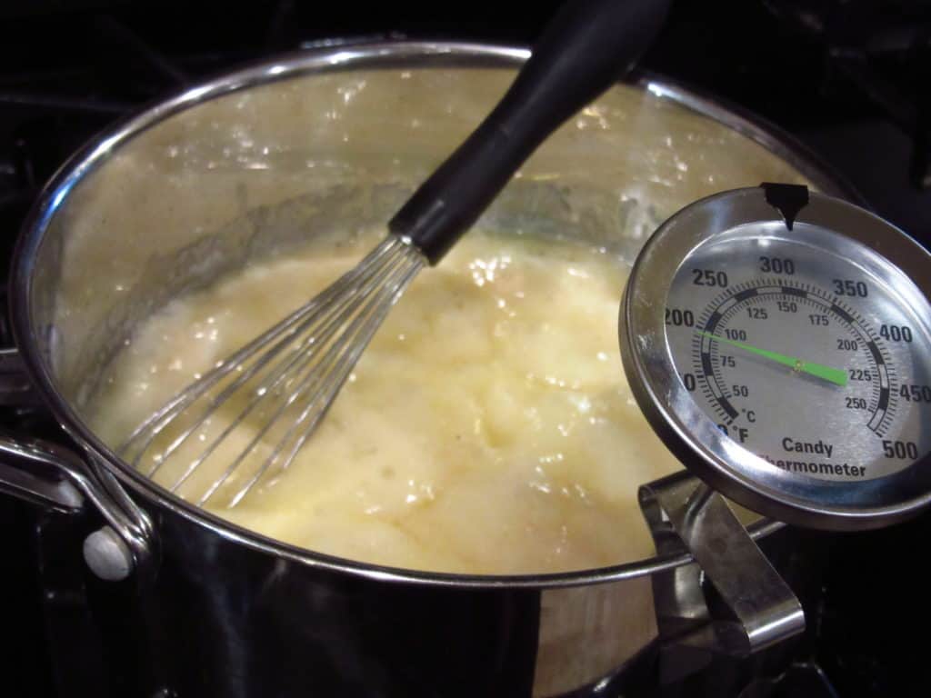 A boiling mixture in a saucepan.