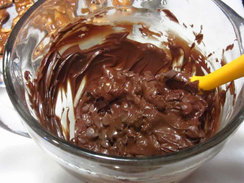 Melting chocolate chips in a glass bowl.