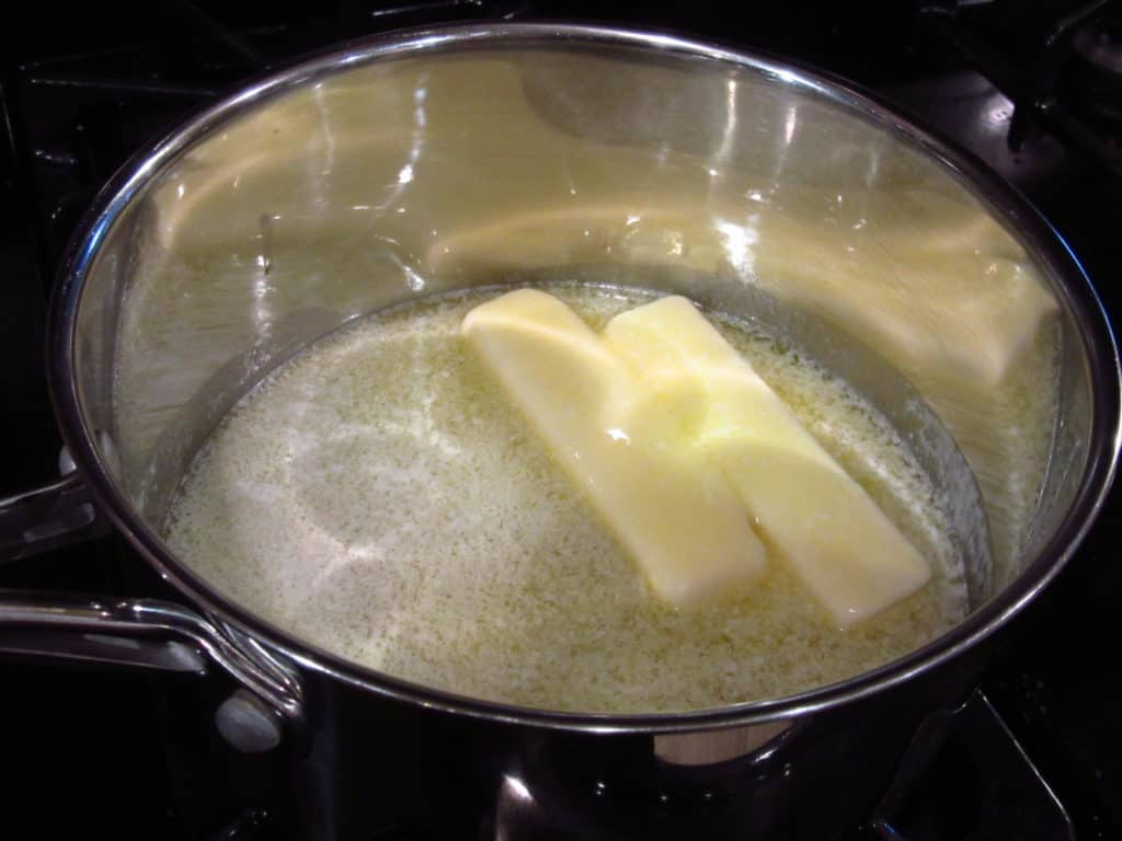 Melting butter in a saucepan.