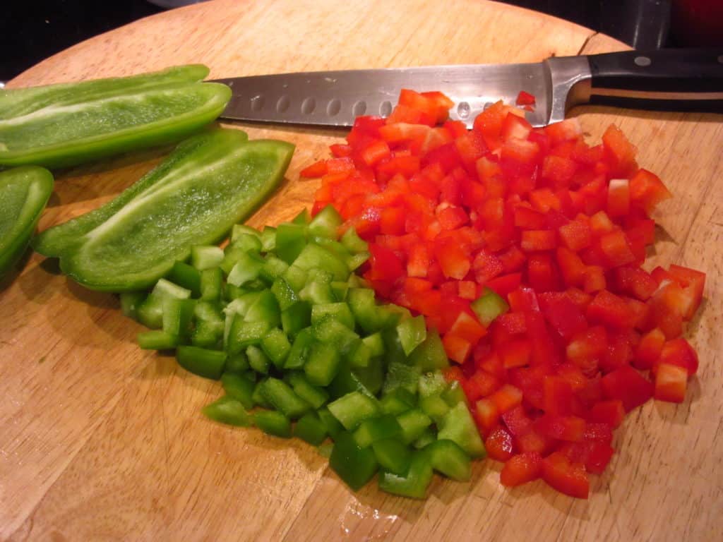 Chopped red and green bell peppers.