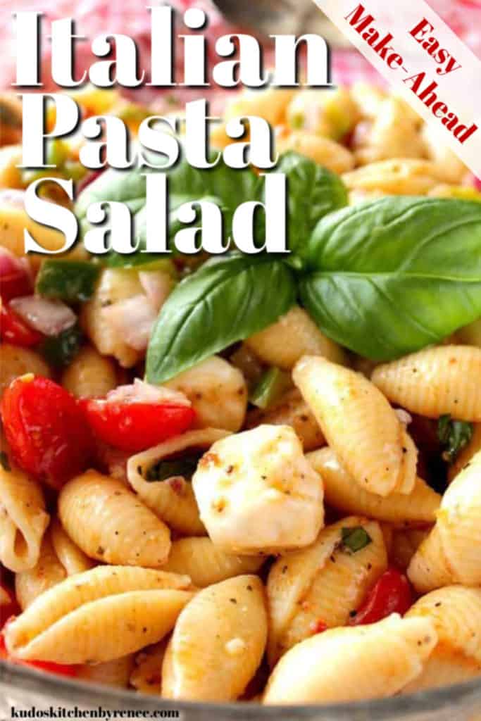 A closeup vertical title text image of Italian pasta salad with fresh mozzarella and basil leaves.