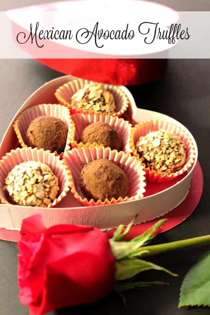 A vertical title text image of a heart box filled with Mexican chocolate truffles with avocados.