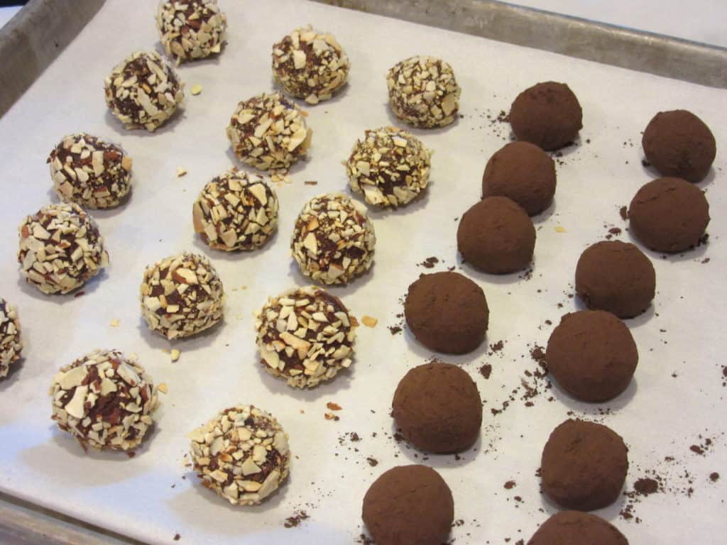 A cookies sheet filled with Mexican Chocolate Avocado Truffles.