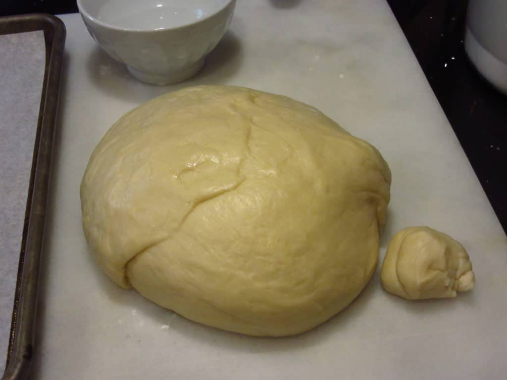 Dough being formed into a bunny.