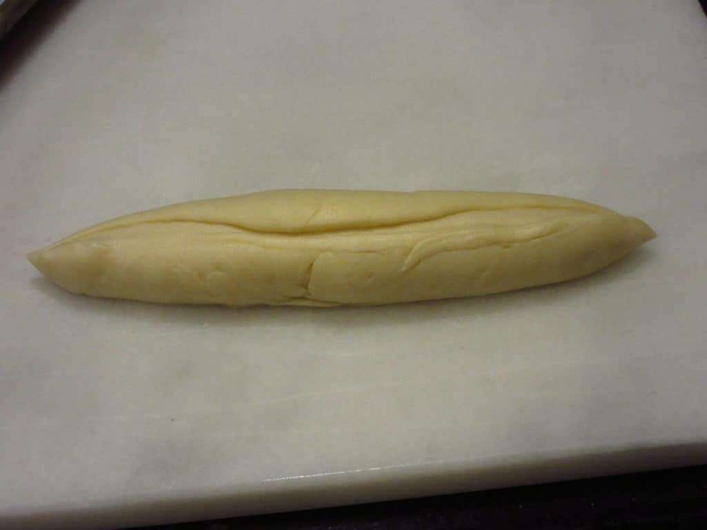 Piece of dough to form bunny.