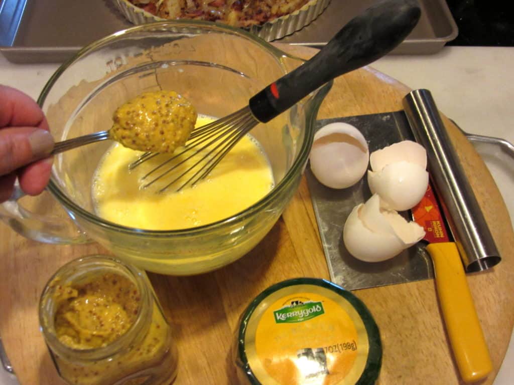 The egg portion of an Irish cheese and potato tart being made.