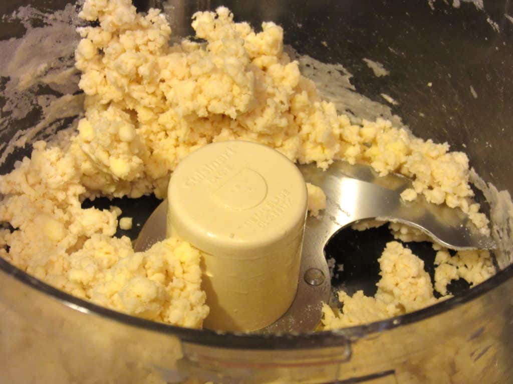 Making a tart dough in a food processor with a blace.