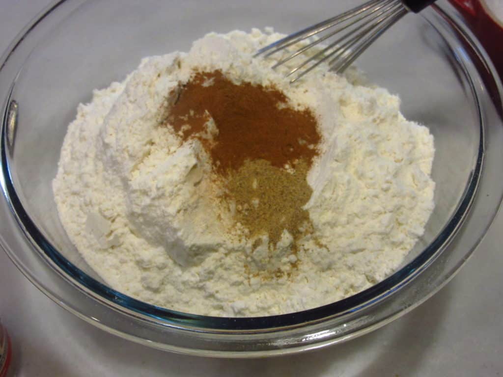 Cinnamon in a bowl with flour.