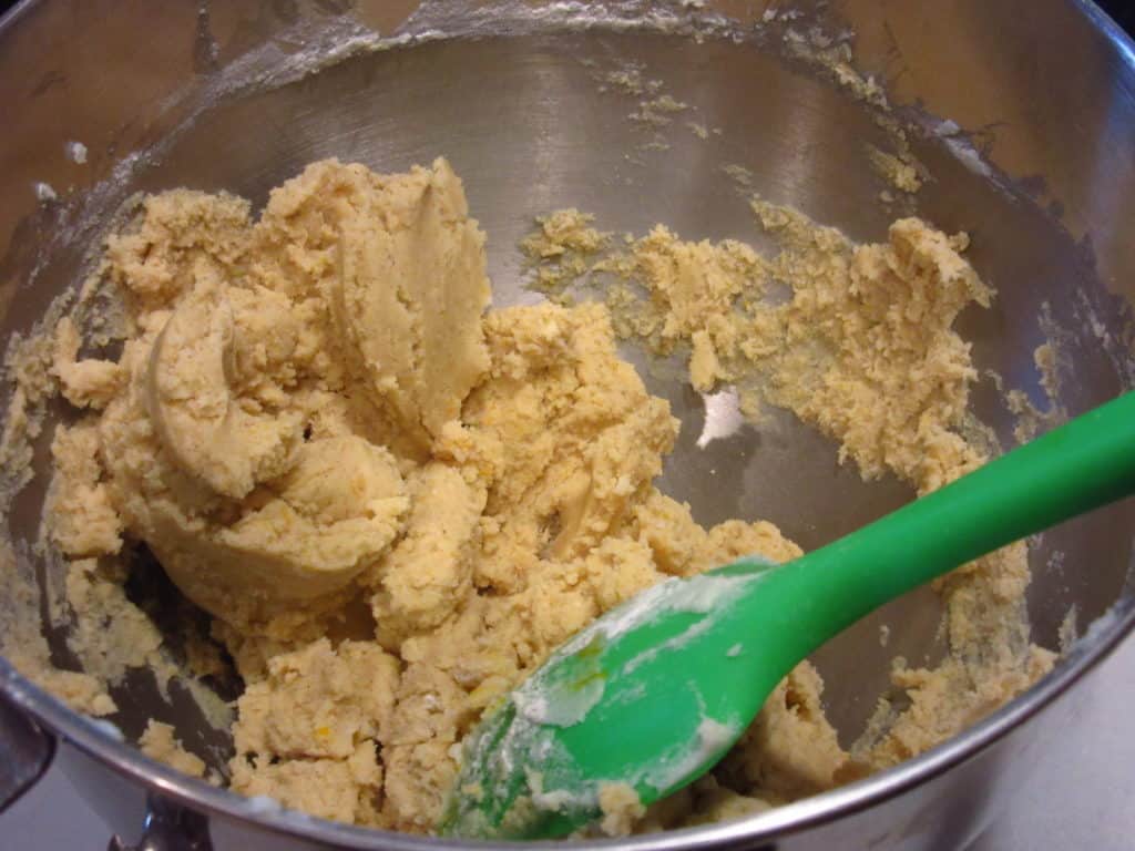 A cookie batter in a bowl with a spatula.