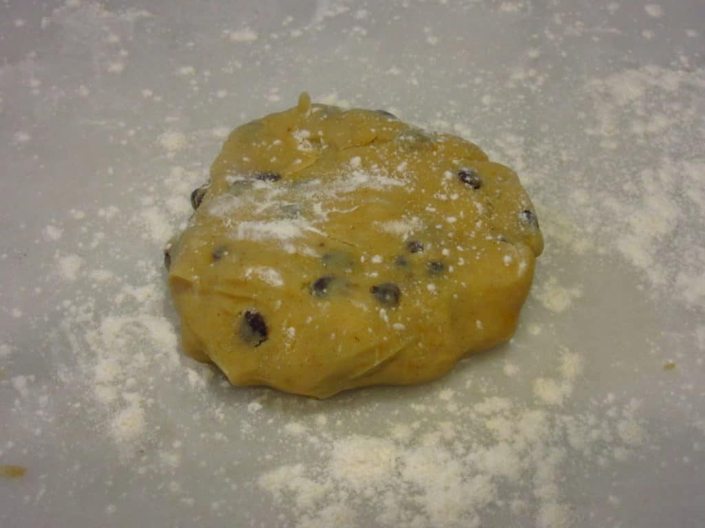 A ball of currant cookie dough.