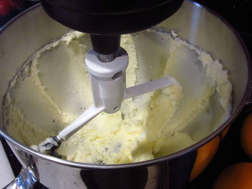 Creamed butter and sugar in a stand mixer bowl.