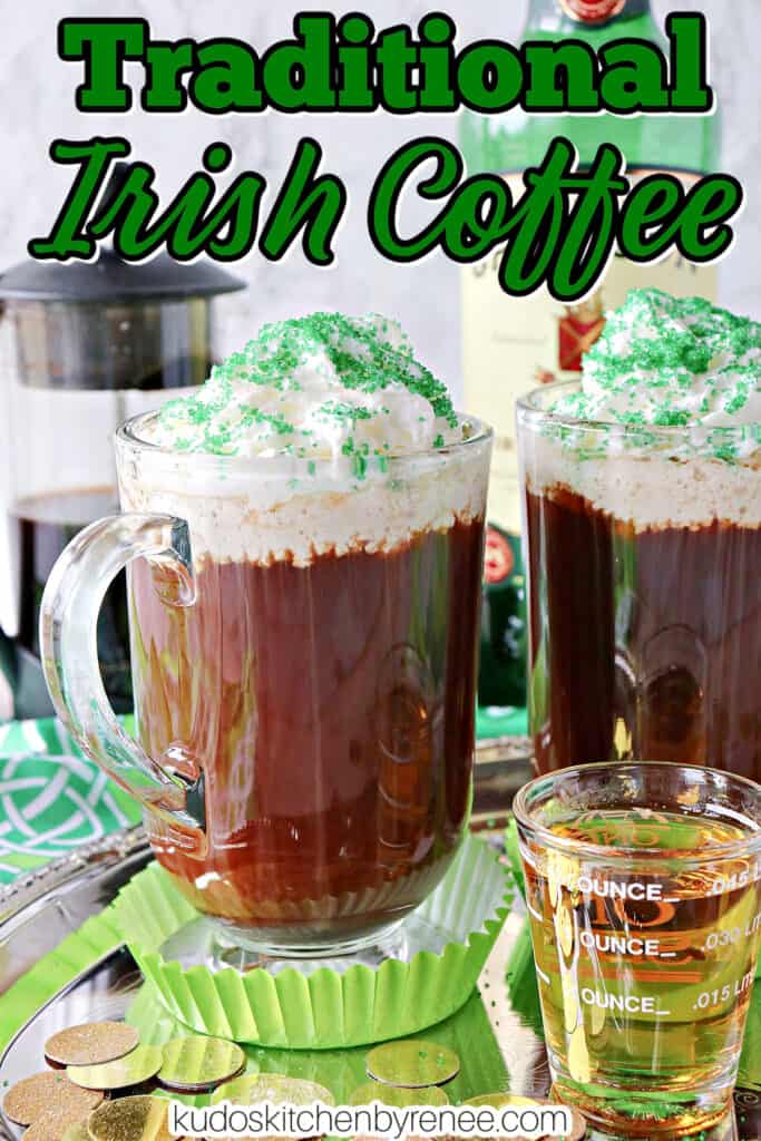 A vertical closeup of a mug of Irish Coffee with whipped cream and green sugar along with a title text overlay graphic.