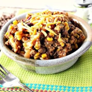 A heaping serving of Slow Cooker Chili Mac in a rustic bowl.