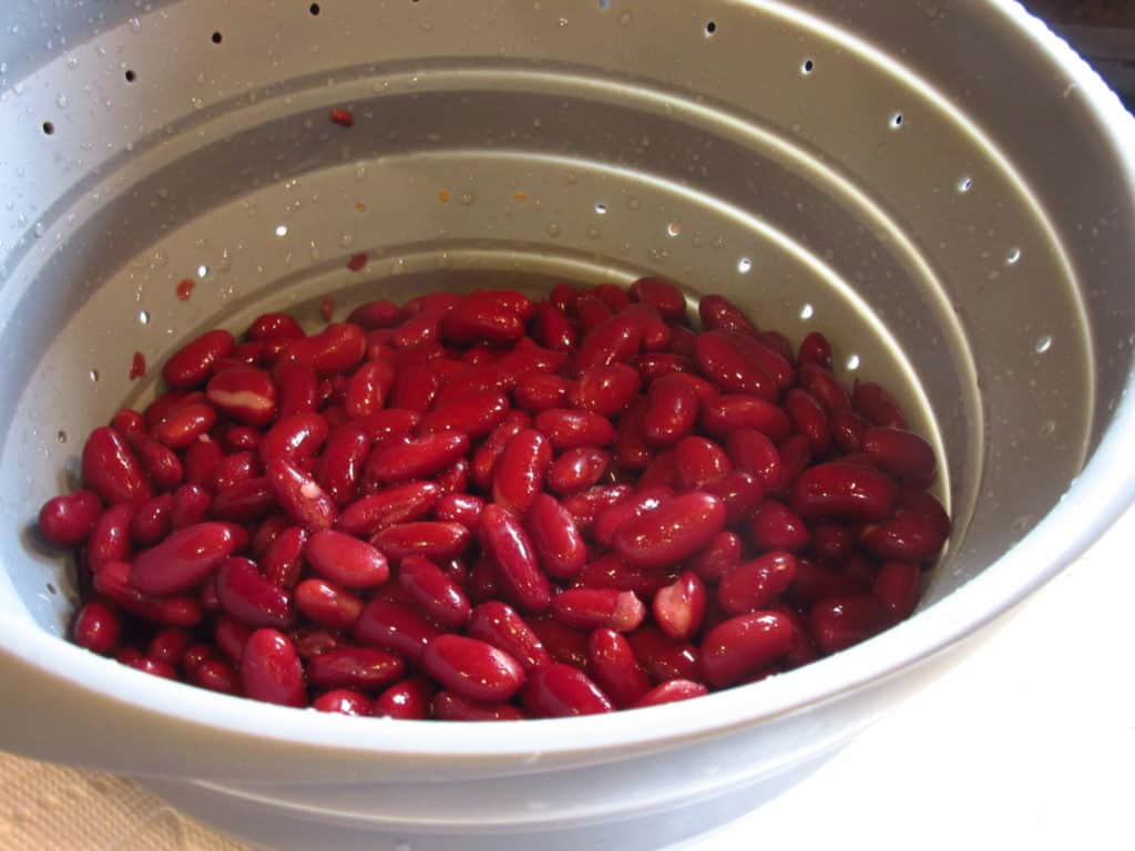 Red kidney beans in a colander.