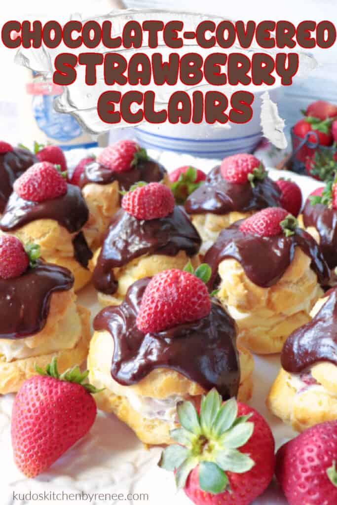 A bunch of Chocolate and Strawberry Eclairs on a platter with fresh strawberries as garnish and a title text overlay graphic.