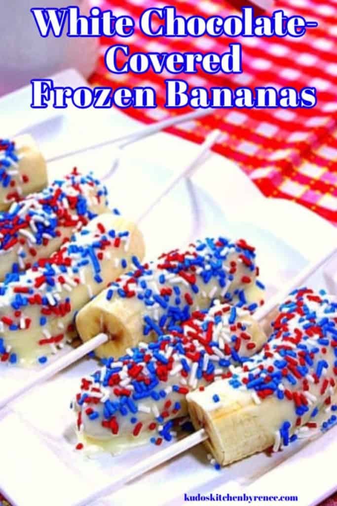 A closeup image of white chocolate covered frozen bananas on a plate with red, white, and blue sprinkles.