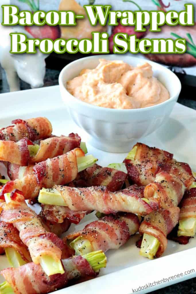 A vertical title text image of bacon wrapped broccoli stems on a white plate with a bowl filled with dipping sauce in the background.