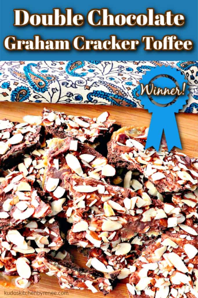 This Double Chocolate Graham Cracker Toffee wins my (self-proclaimed) blue ribbon award for the best and easiest candy I have ever made. Since I've made it twice in the past week, that's proof positive! When you make it, you'll understand why! Trust me. - www.kudoskitchenbyrenee.com Vertical closeup image of a pile of double chocolate graham cracker toffee with almond slices and a title text graphic overlay.