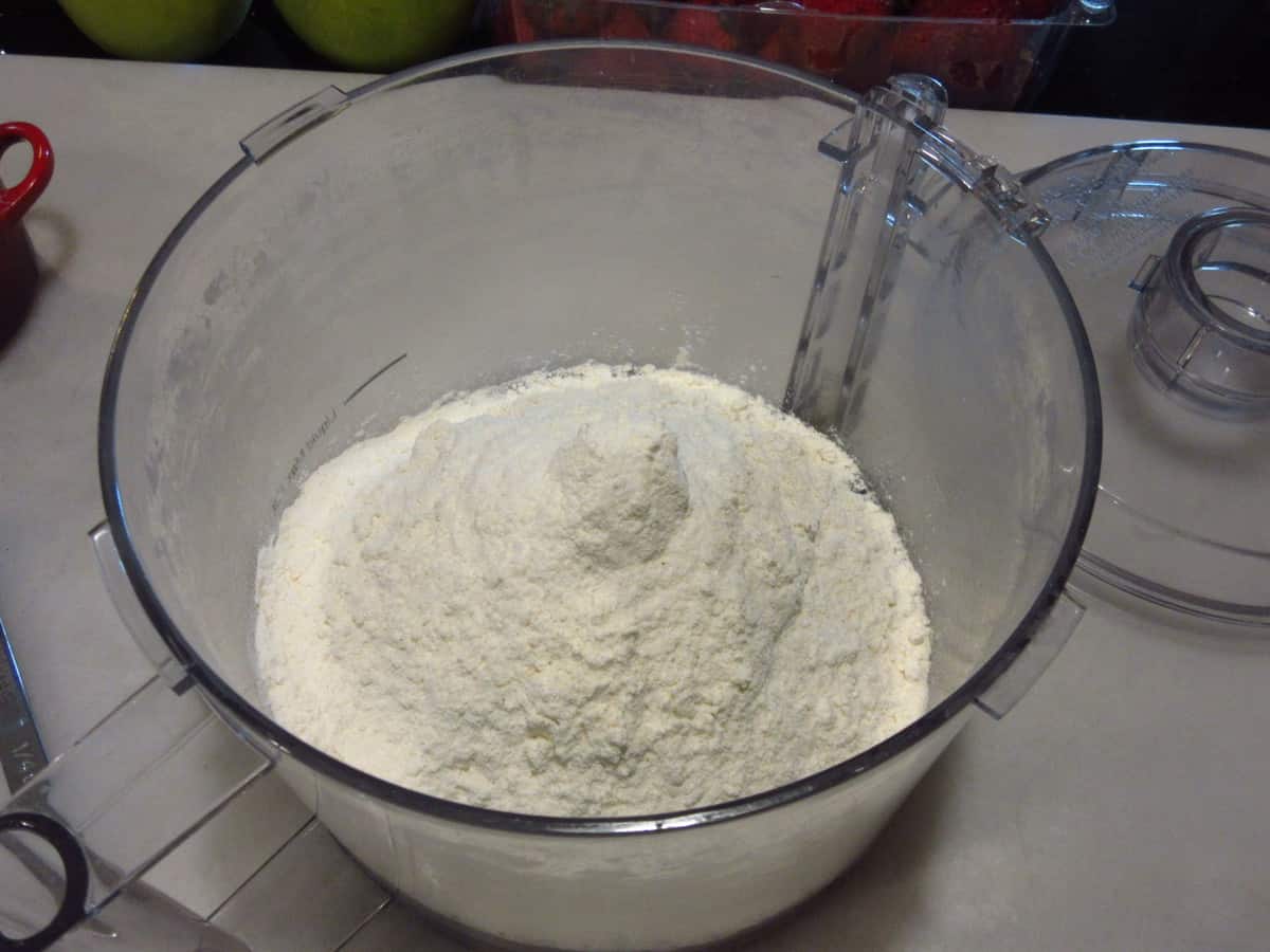 Flour in the bowl of a food processor.