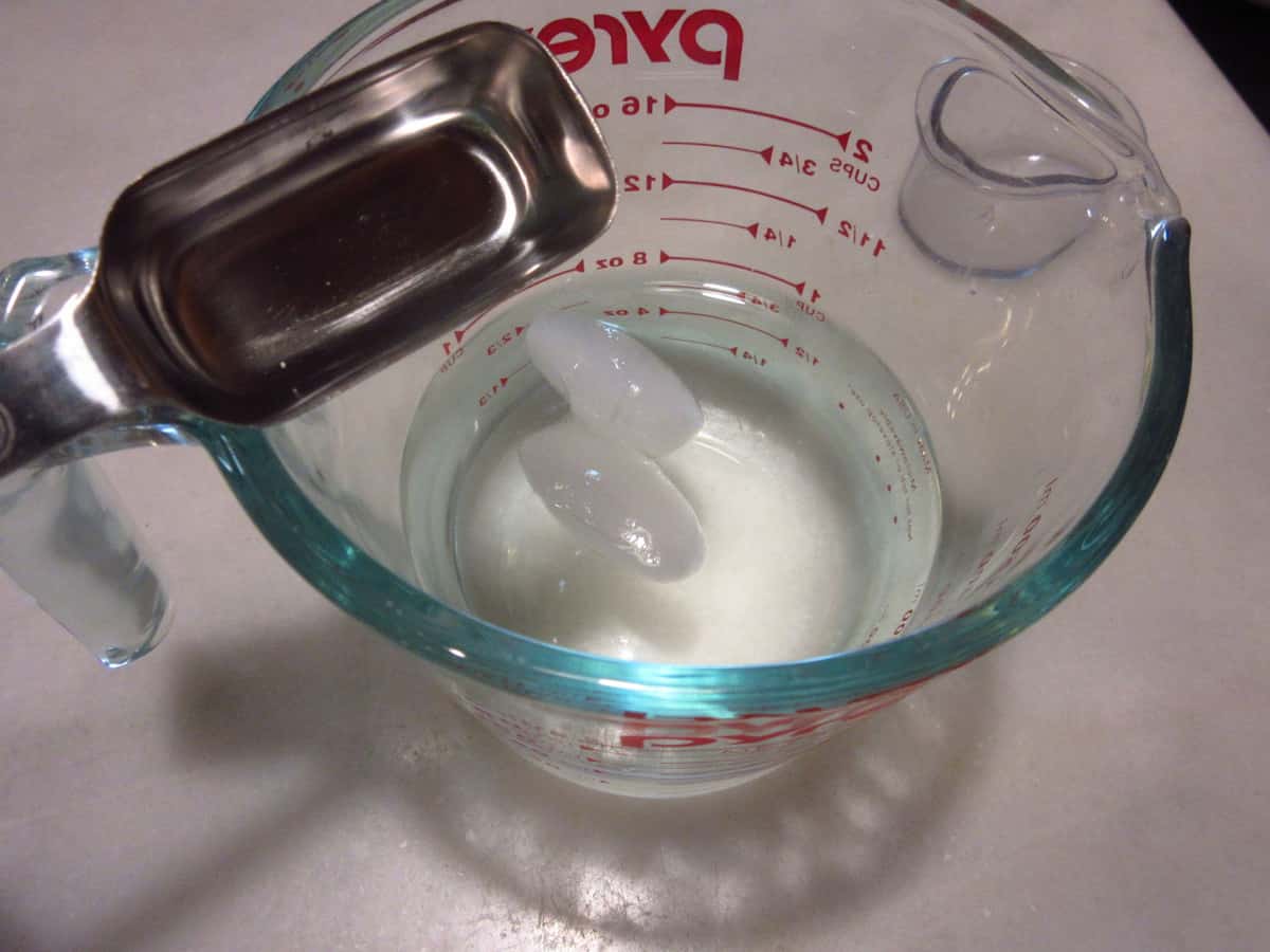 Ice water in a glass measure for making pie dough.