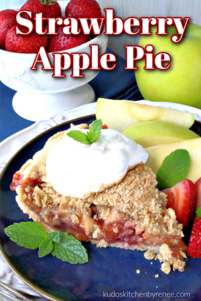 A vertical photo of a slice of strawberry apple pie on a plate with whipped cream and fresh mint with title text graphic overlay