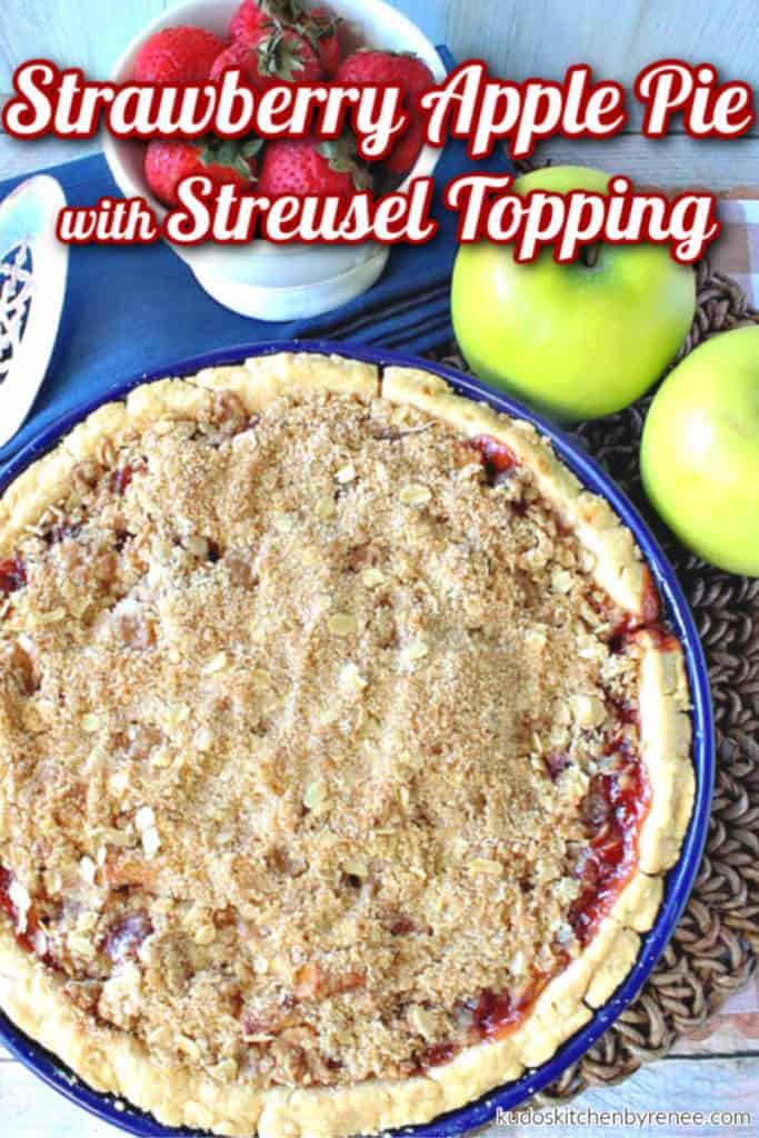 An overhead vertical photo of an entire strawberry apple pie with streusel topping and title text overlay graphics.