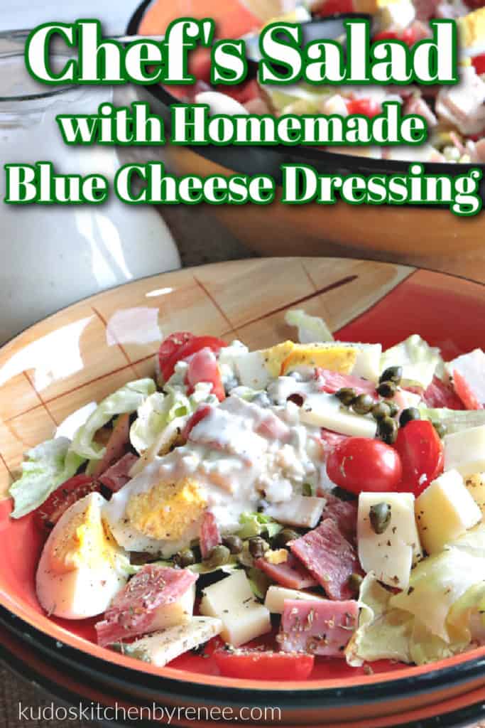 A title text overlay graphic for a vertical photo of a chef's salad with homemade blue cheese dressing with capers, tomatoes, meats and cheeses.