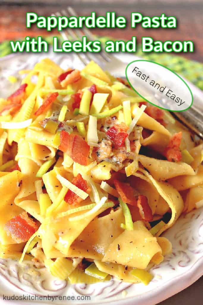 A closeup vertical photo of pappardelle pasta with leeks and bacon with title text overlay graphic