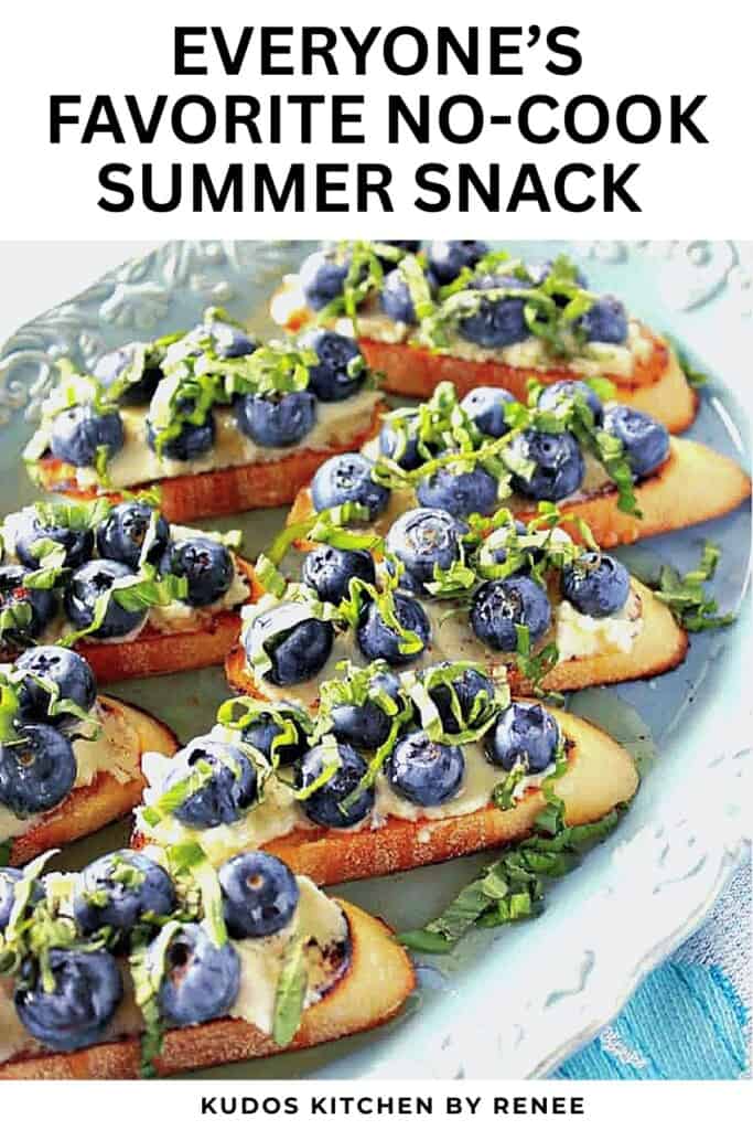 A blue platter filled with blueberry basil bruschetta.