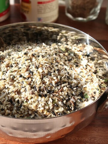 A small silver dish filled with Homemade Everything Seasoning Blend.