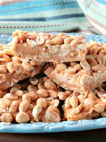 Copycat Payday Candy Bars on a blue plate.