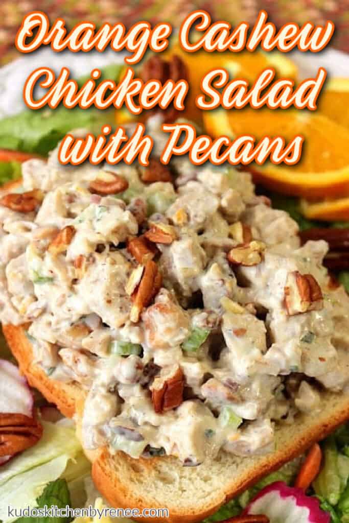 Orange Cashew Chicken Salad with orange slices and chopped pecans.